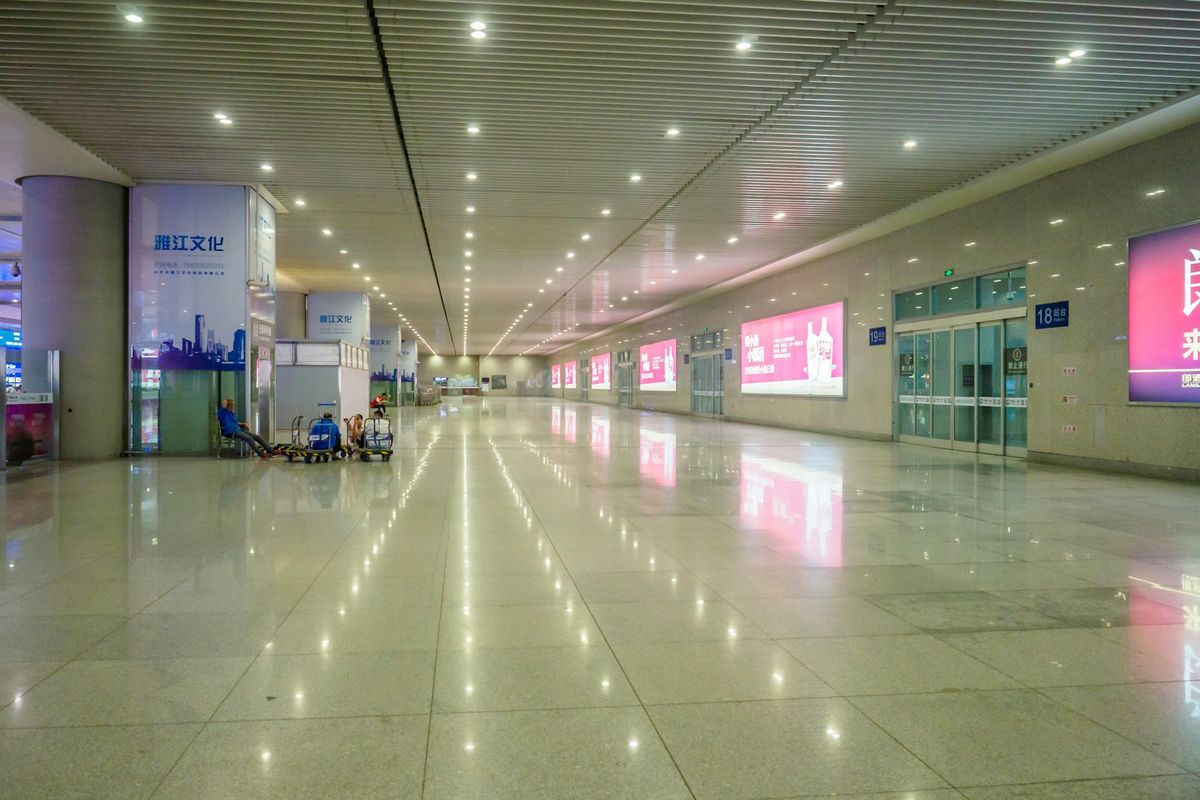 Empty modern airport terminal with seating
