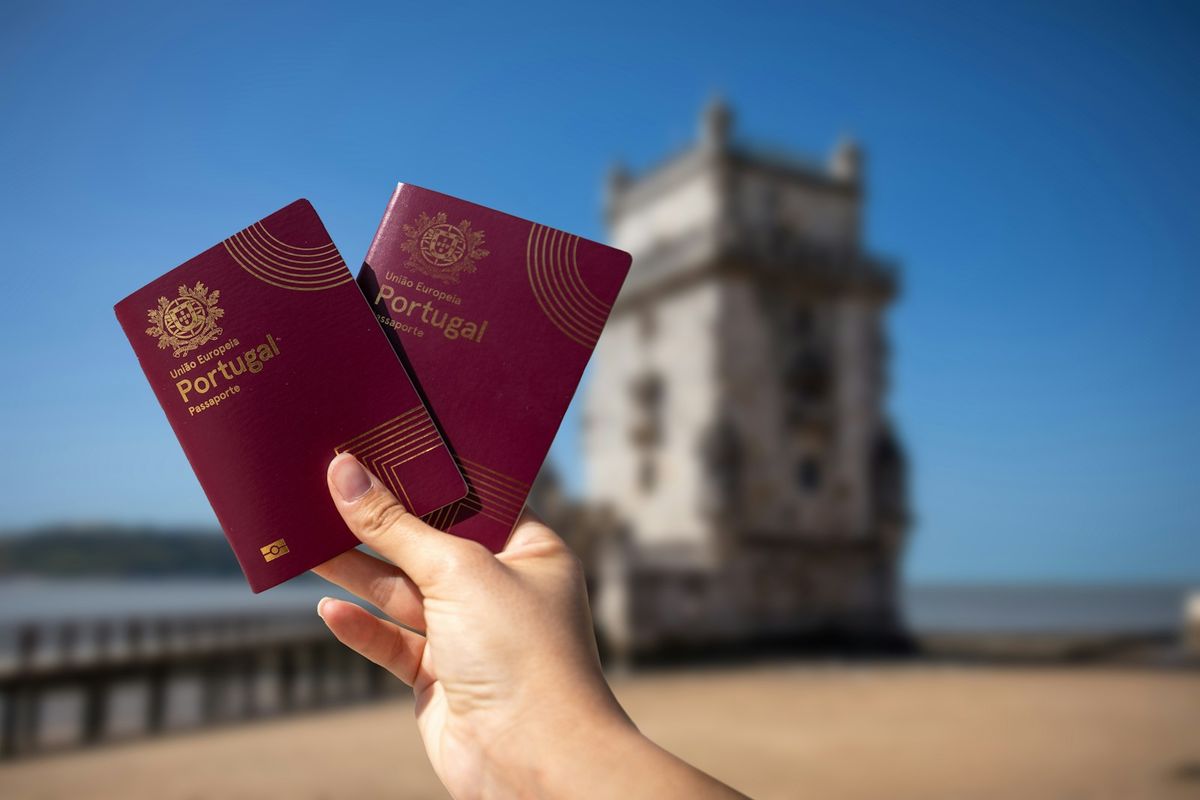 Holding two passports while traveling