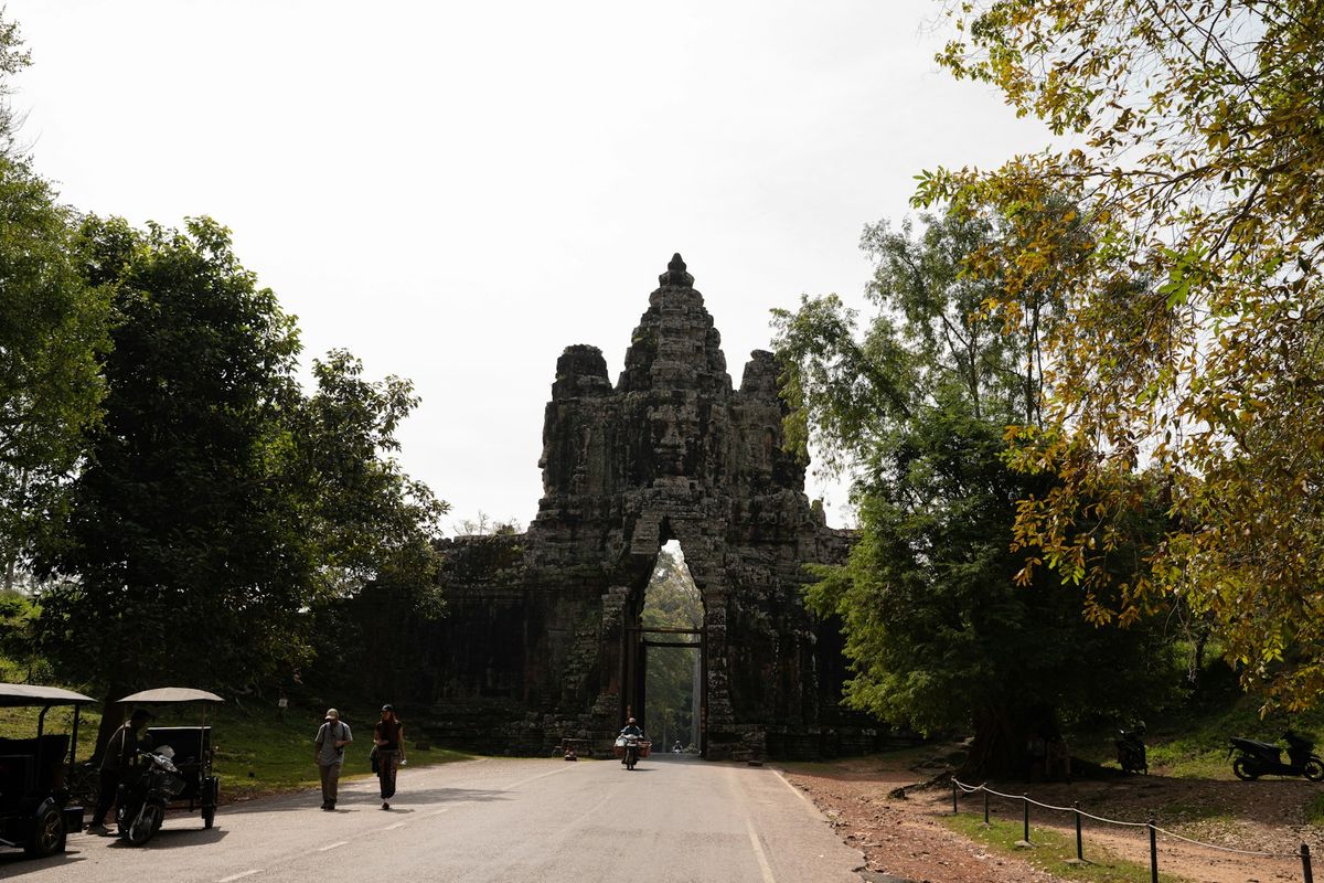 Ancient stone temple gate at Angkor, a major tourist attraction in Cambodia
