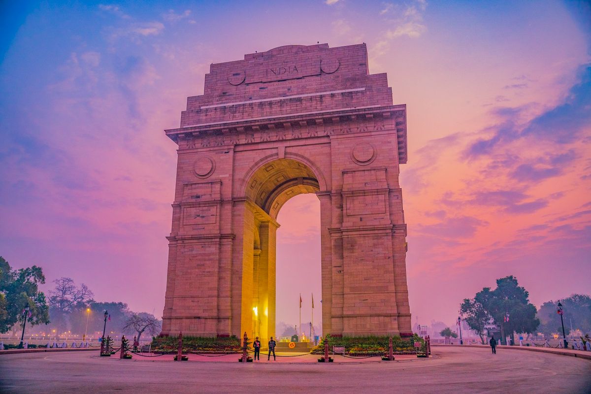 India Gate arch monument Delhi under blue sky