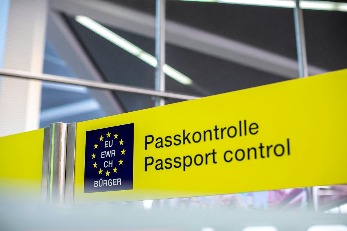 Passport control sign at airport border