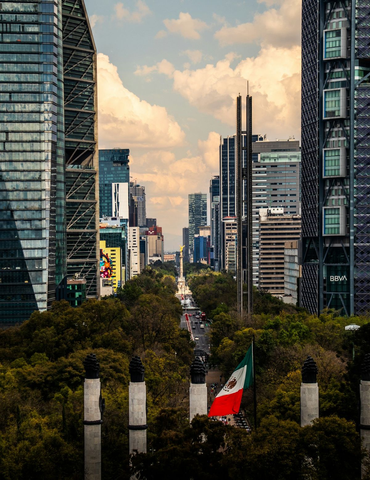 Mexico City skyline with the Mexican flag