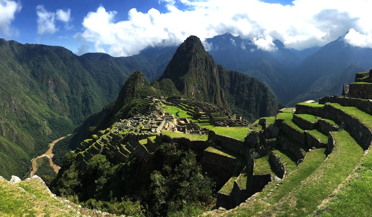 Machu Picchu ancient ruins with mountain backdrop Peru