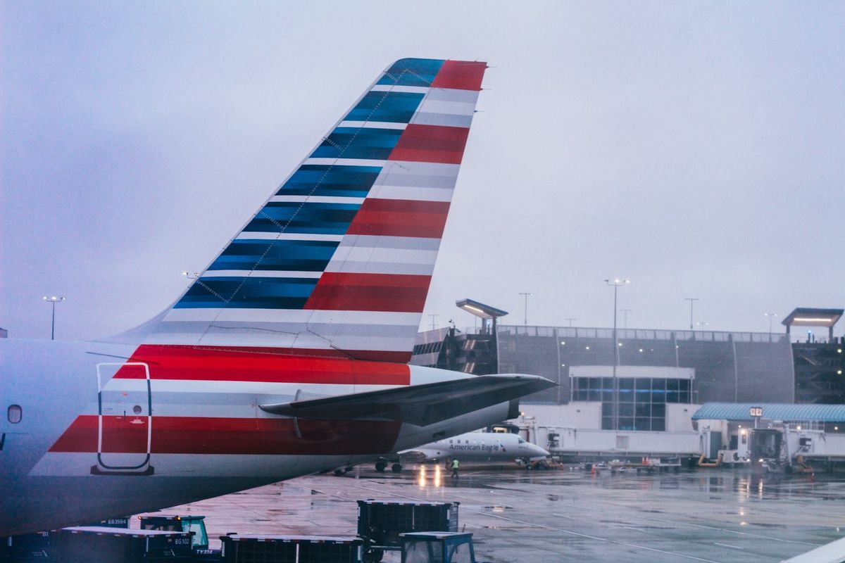 Large passenger jet on airport tarmac preparing for international flight
