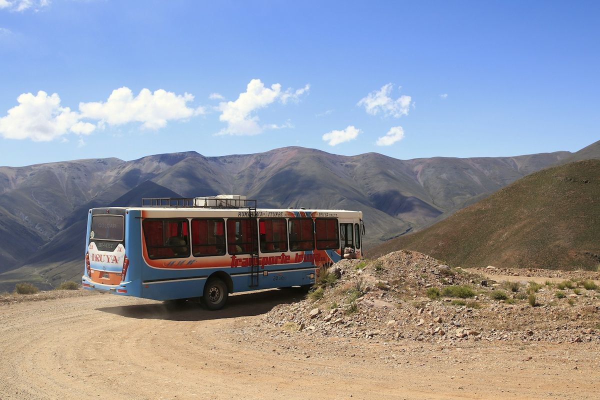 A long-distance coach on a mountain highway