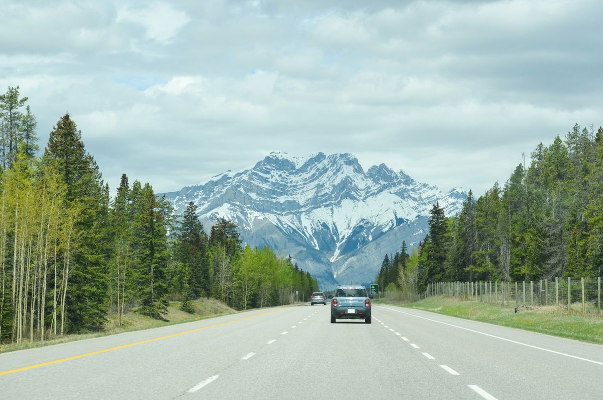Highway through the snow-capped Canadian Rockies