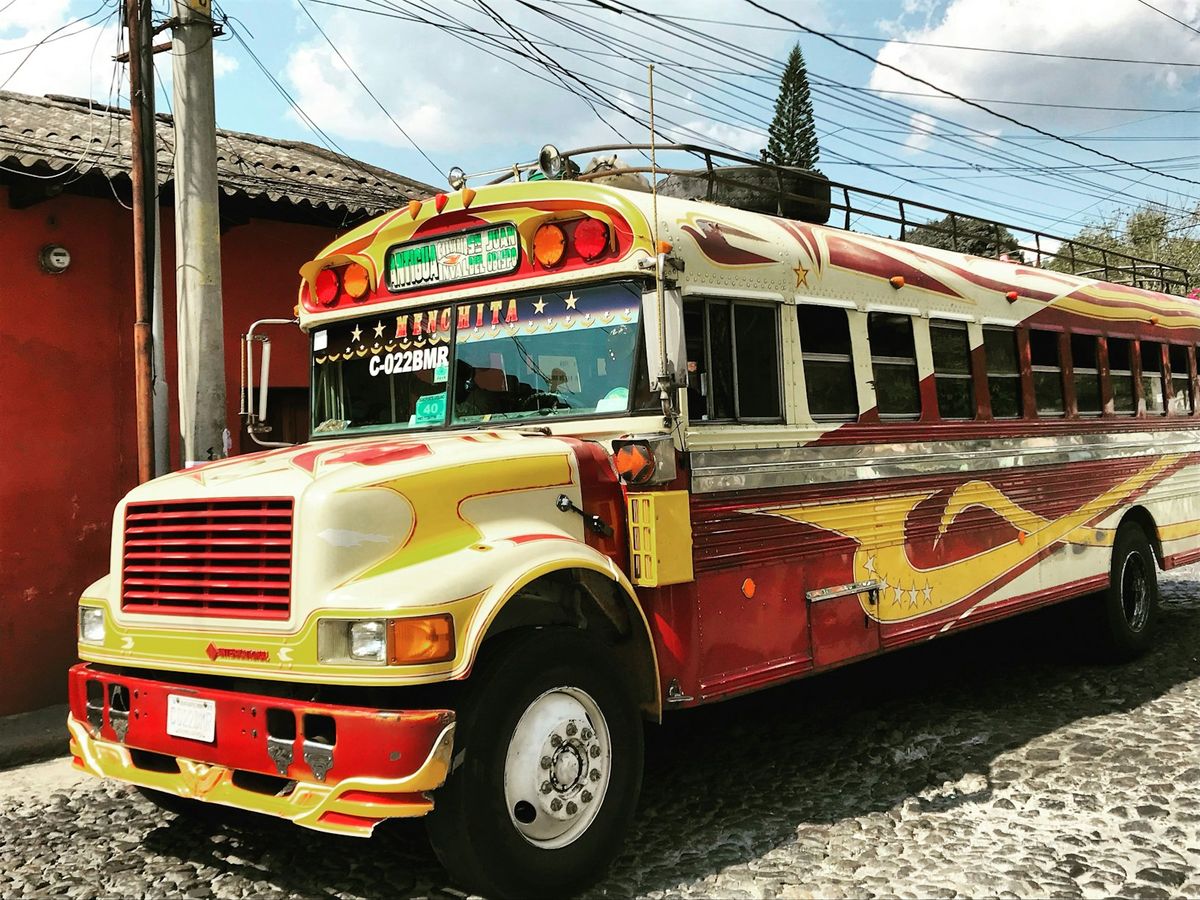 A colourful Guatemalan chicken bus parked on the street