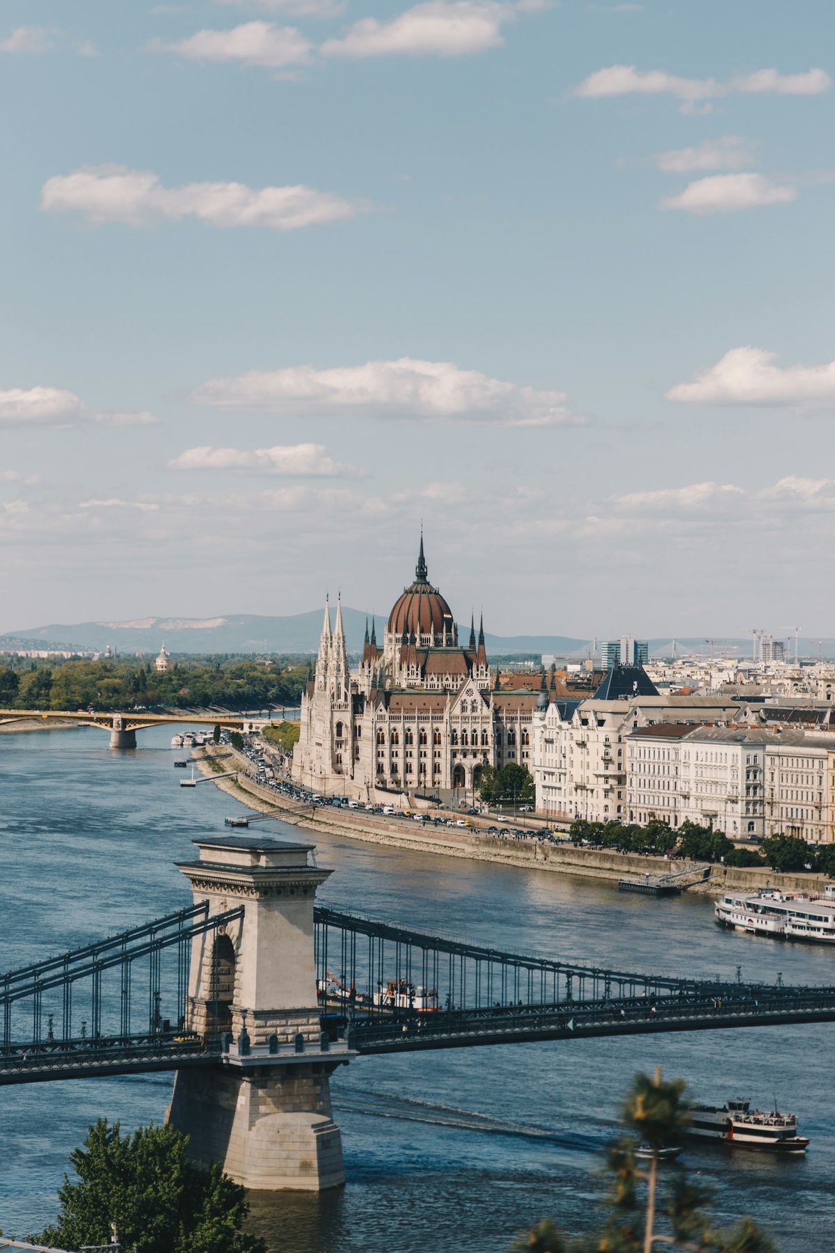 Hungarian Parliament building with bridge over the Danube River in Budapest