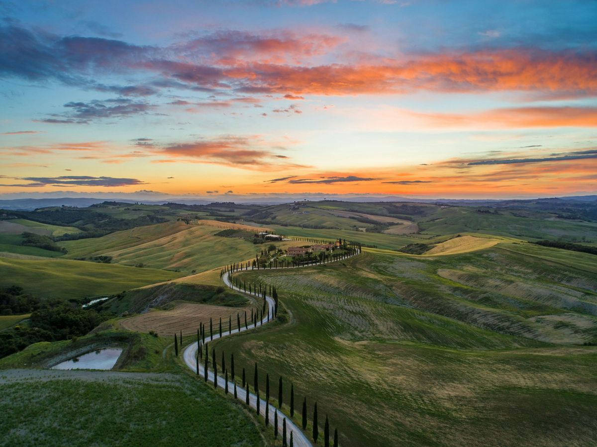 A road through the Italian countryside at golden hour