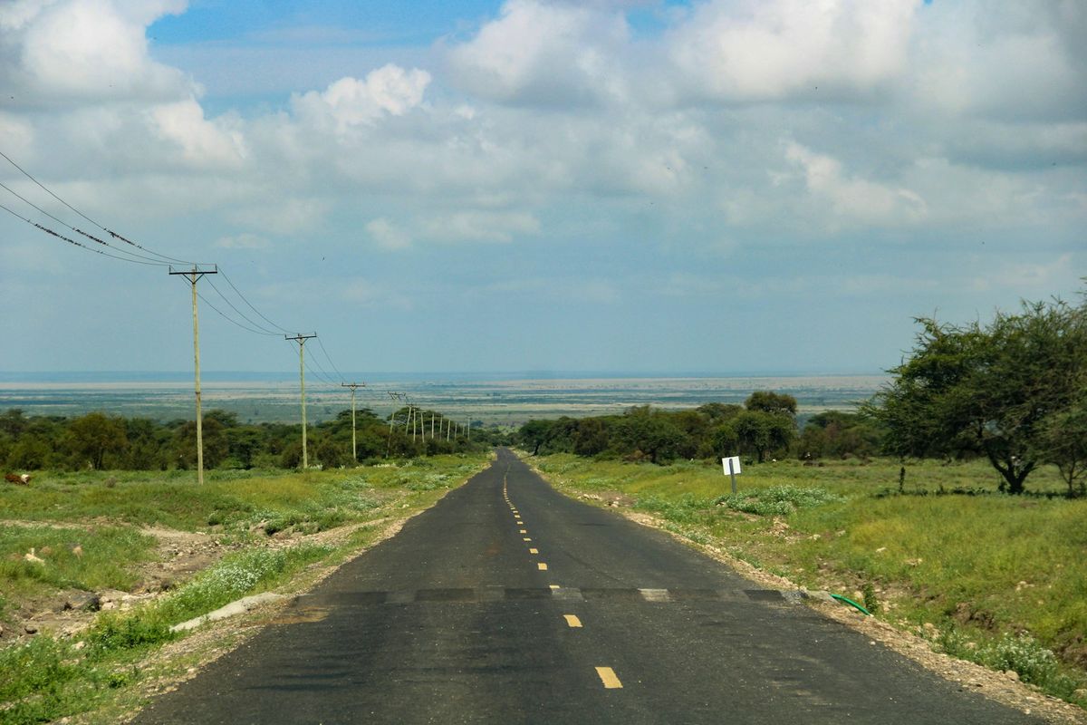 A long open highway under a big sky in Kenya