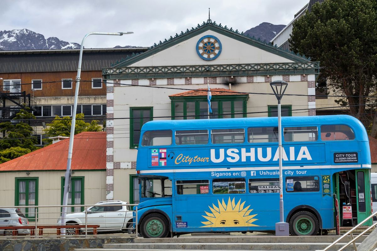 Blue double-decker long-distance bus in Ushuaia Patagonia