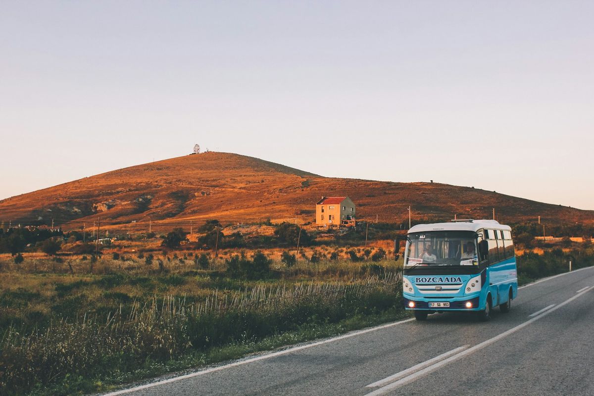 Blue intercity bus on road in Turkey