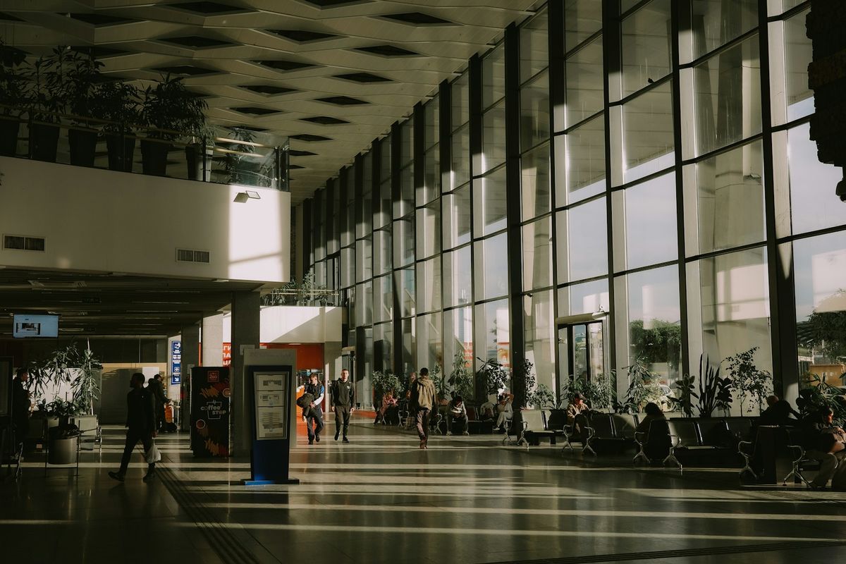 Modern transportation hub interior with large windows