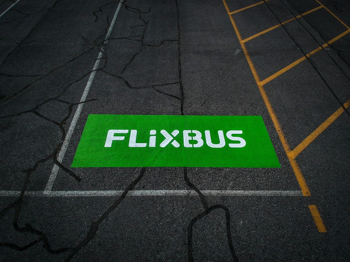 Flixbus green long-distance coach at bus stop