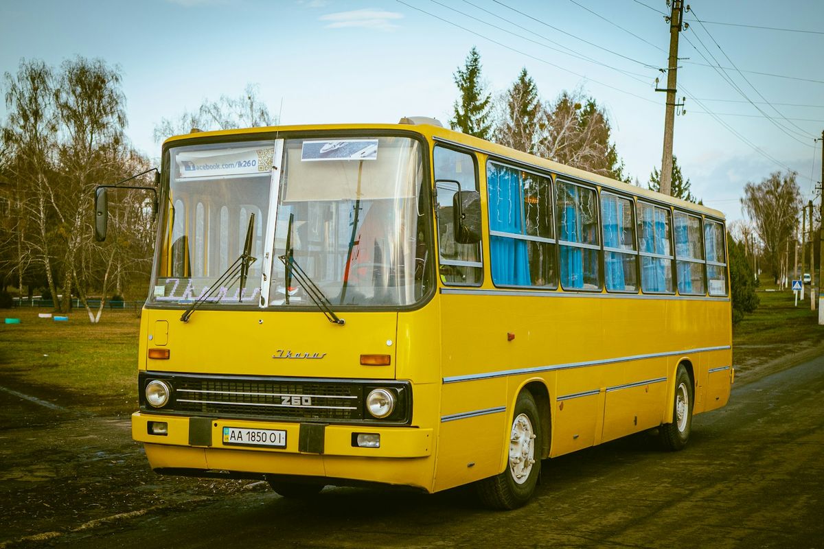 Yellow minibus on a road in Eastern Europe