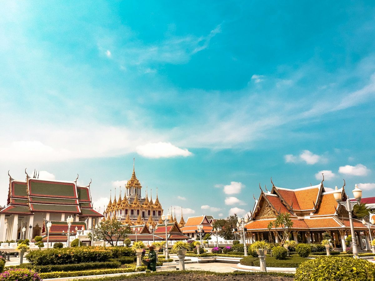 Bangkok temple skyline with orange rooftops at Grand Palace