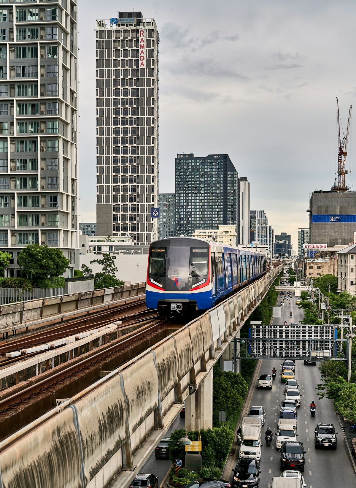 Elevated rail transport crossing a bridge in Bangkok