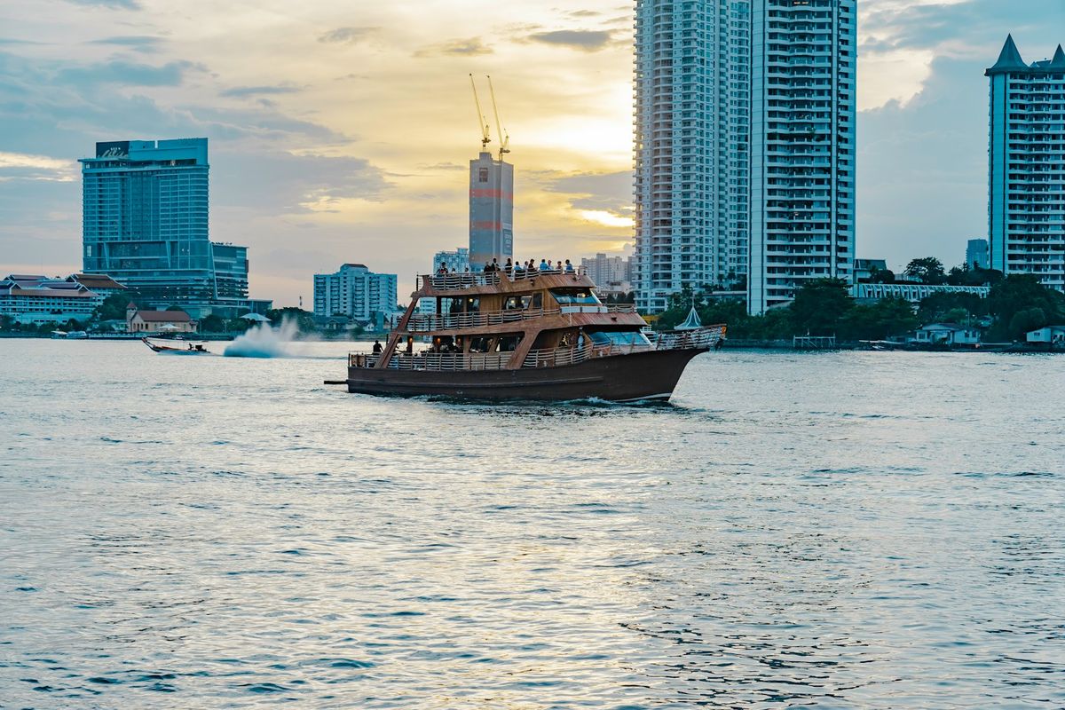 Boat traveling on the Chao Phraya river, Bangkok
