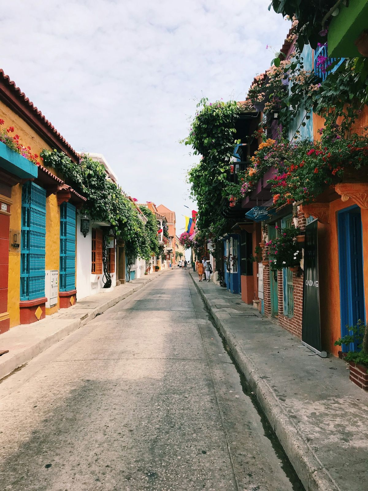 Narrow colonial street at street level in Cartagena old town