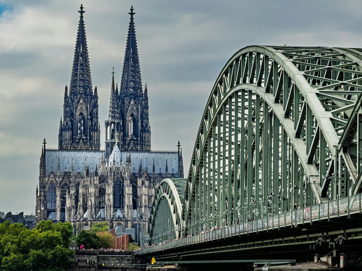 Cologne Cathedral and Hohenzollern Bridge over the Rhine River