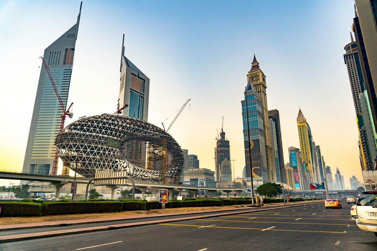 Dubai metro train and city street