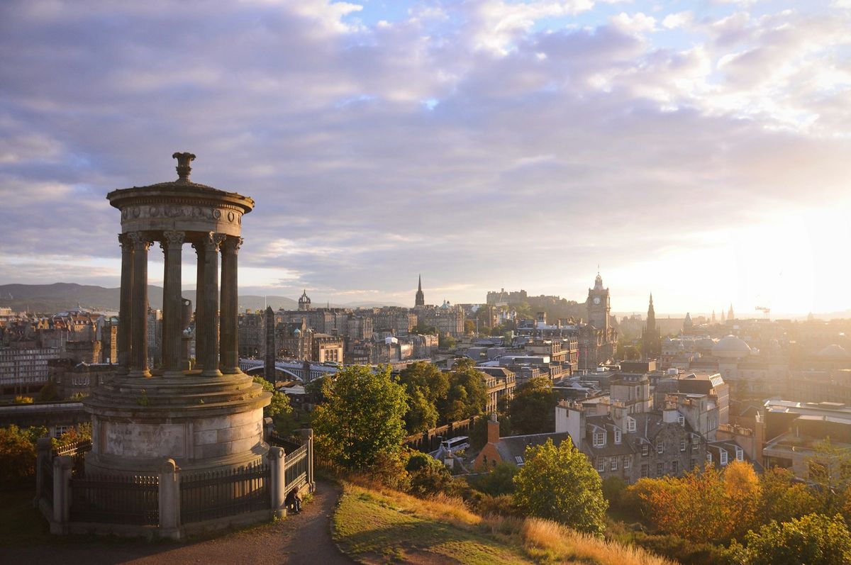Edinburgh cityscape with Calton Hill monument at sunrise