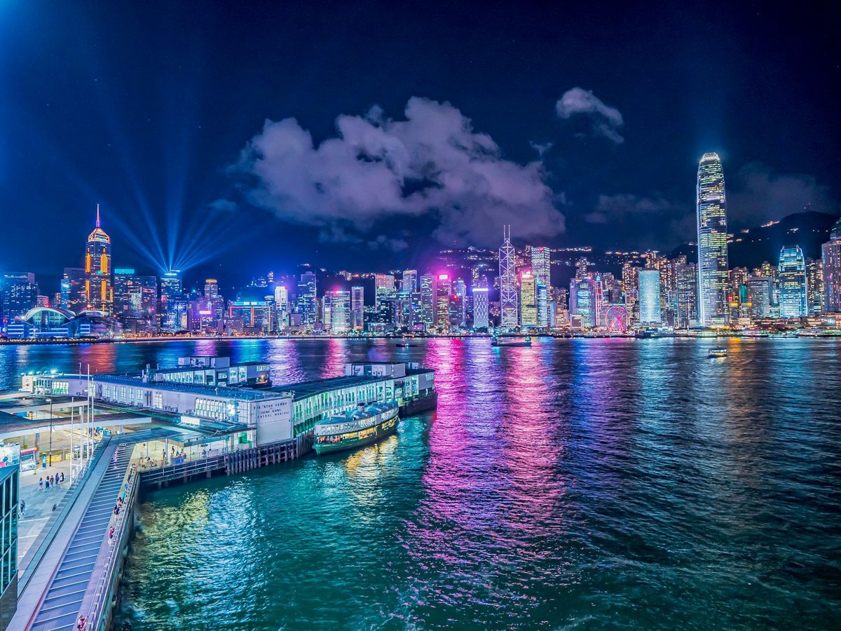 Hong Kong city skyline at night viewed from across the harbour