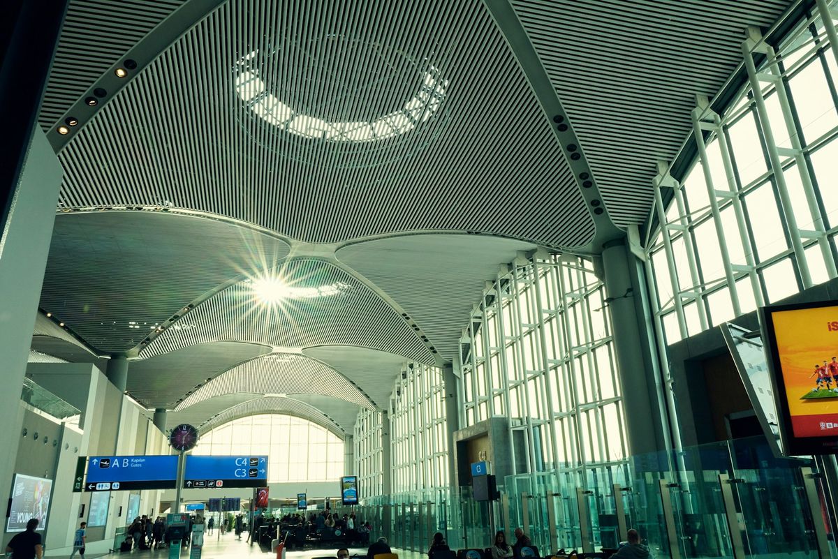 Spacious terminal hall with high ceiling at Istanbul Airport (IST)