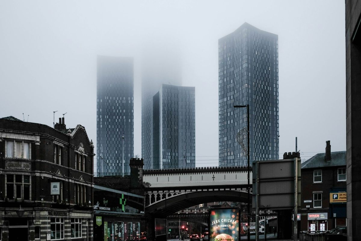 Manchester city buildings under wide sky