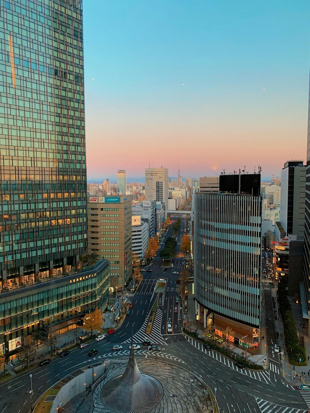 Nagoya city buildings under a blue sky