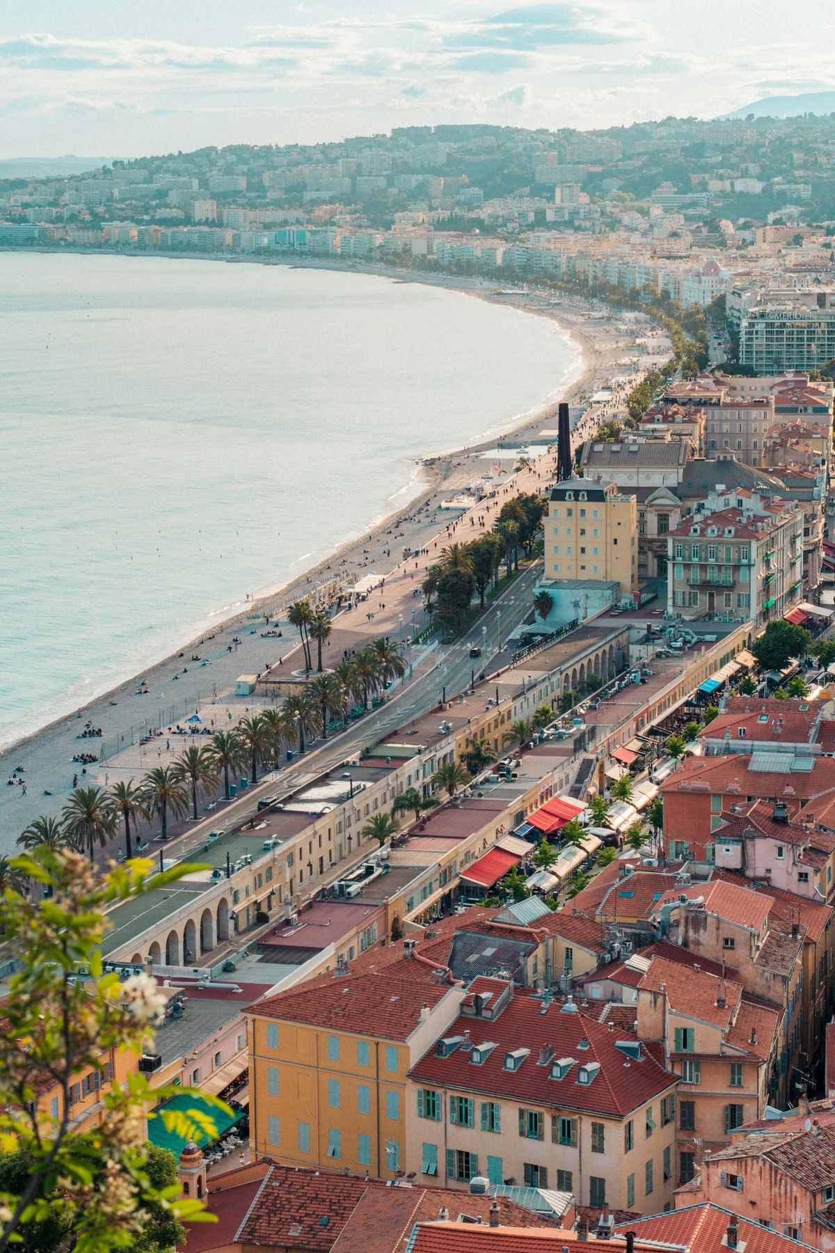 Curving coastal Nice France with Promenade des Anglais and blue sea