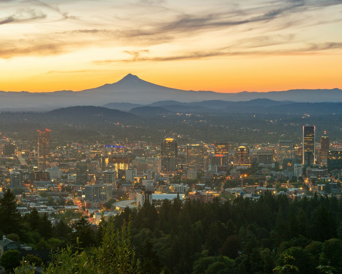 City skyline near Mount Hood at sunset in Portland, Oregon