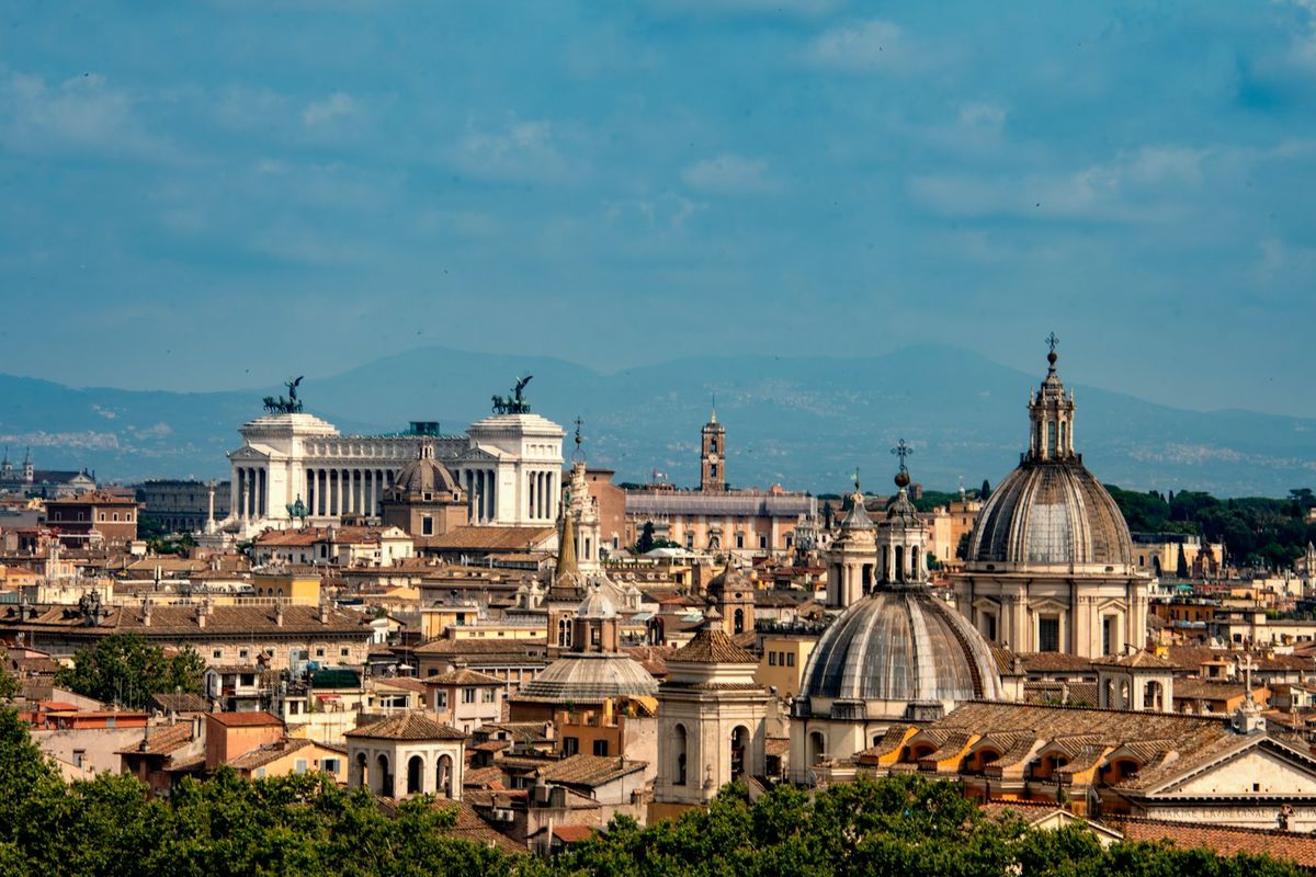 Rome skyline with the Altare della Patria monument and historic domes