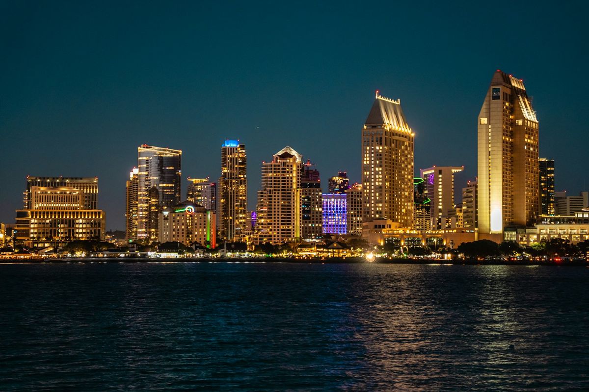 San Diego city skyline illuminated at night over the water
