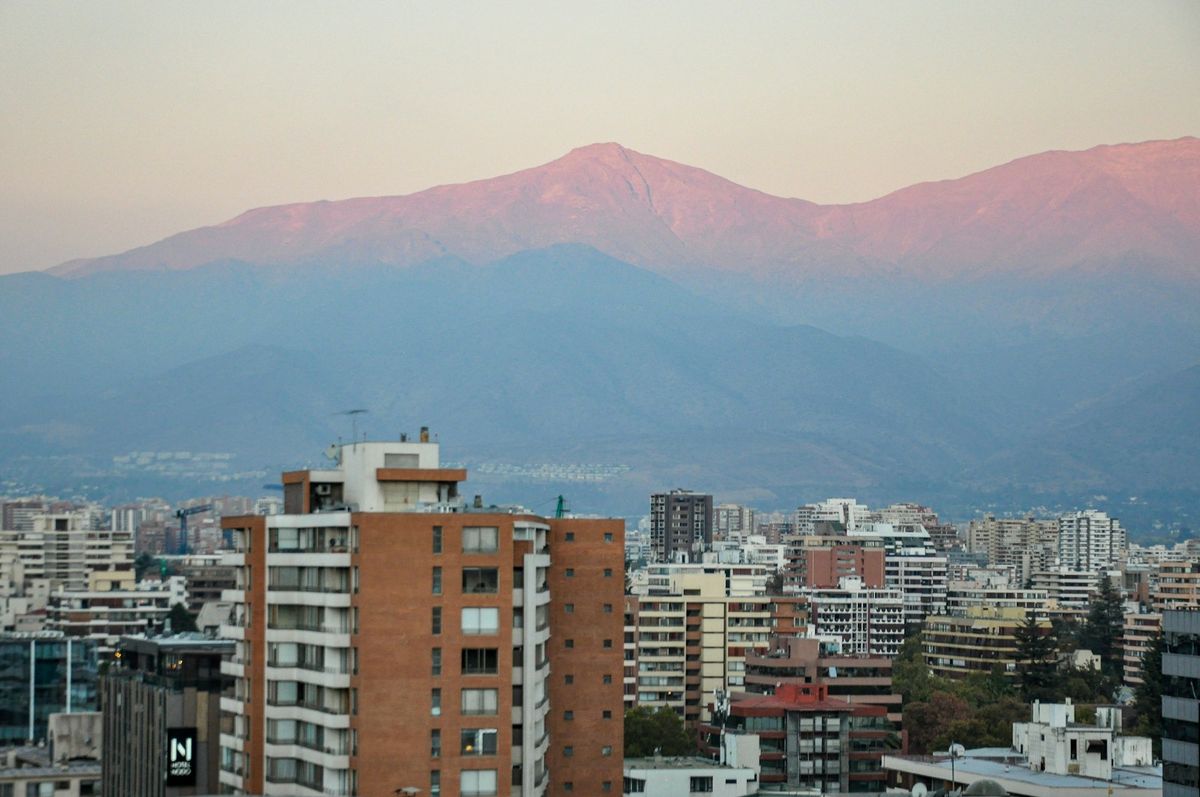 Santiago skyline with Andes at dusk