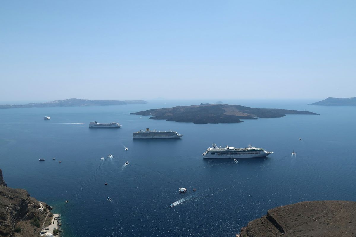 Cruise ships anchored in the Santorini caldera below Fira