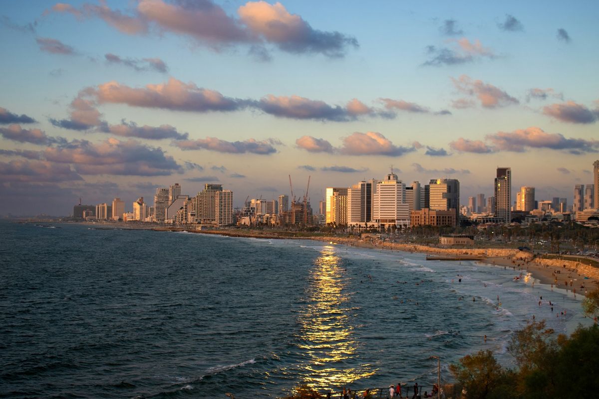 Tel Aviv beach with city skyline in the background