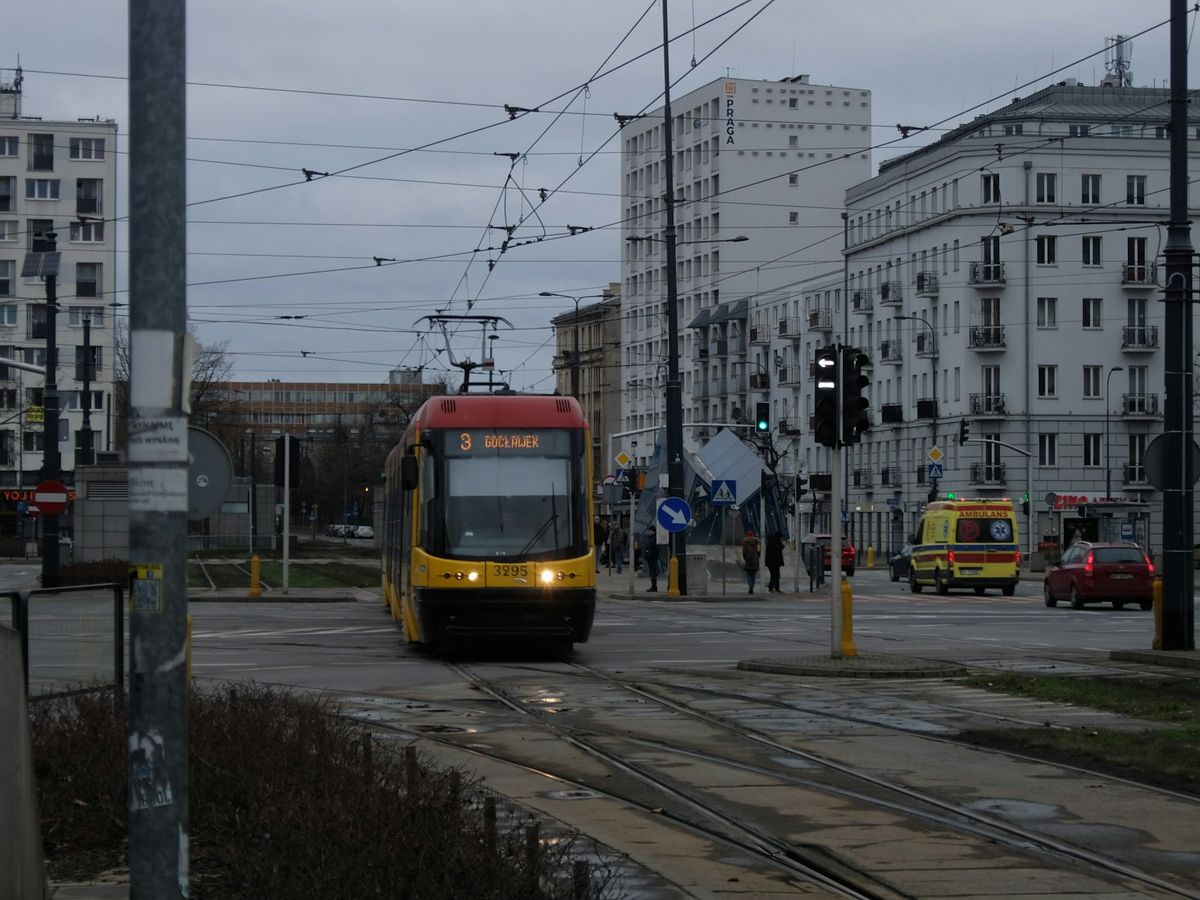 Tram on a city street in Warsaw Poland