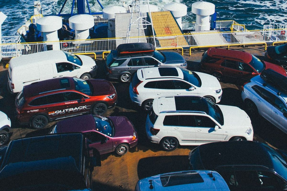 Vehicles parked on a car ferry deck