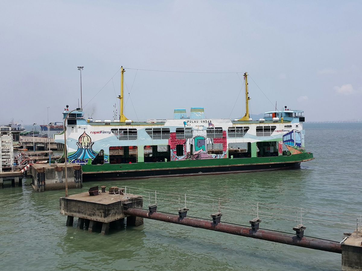 Ferry boat docked at a pier in Malaysia