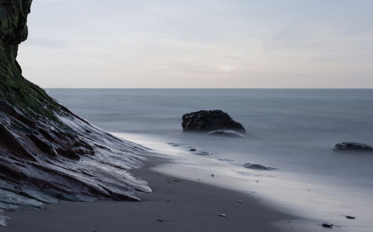 Red sandstone rock formation on Helgoland shore, North Sea