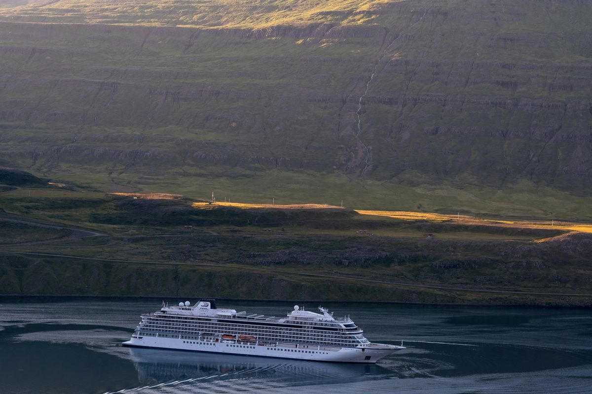 Ferry ship sailing through an Icelandic fjord