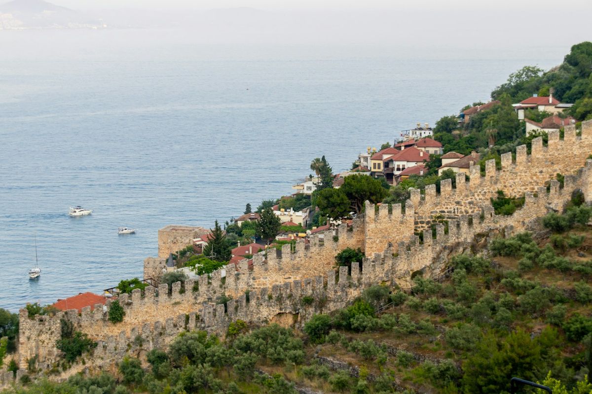 Ancient fortress walls of Kotor old town overlooking the calm bay
