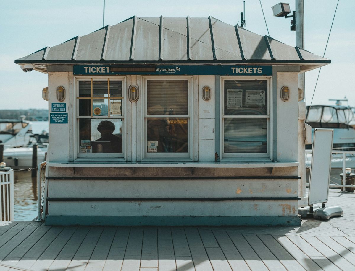Small ferry ticket booth with an attendant