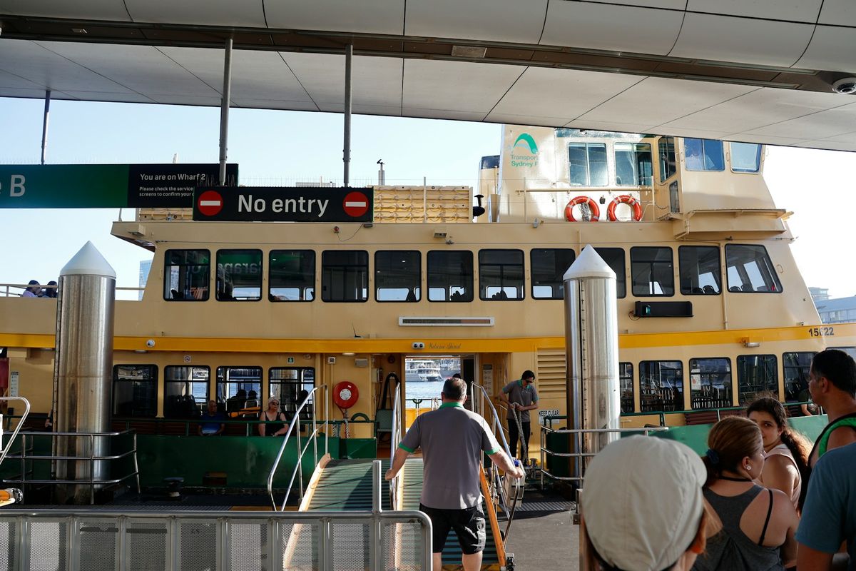 Passengers boarding a ferry at the dock