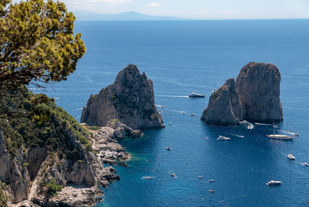 Rocky Faraglioni sea stacks off the coast of Capri Italy
