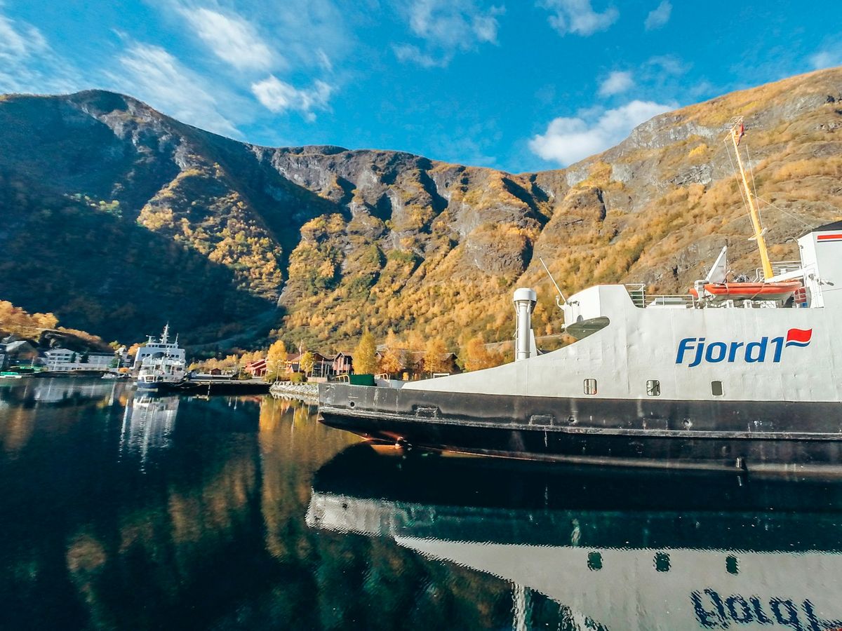 Car ferry sailing through a Norwegian fjord