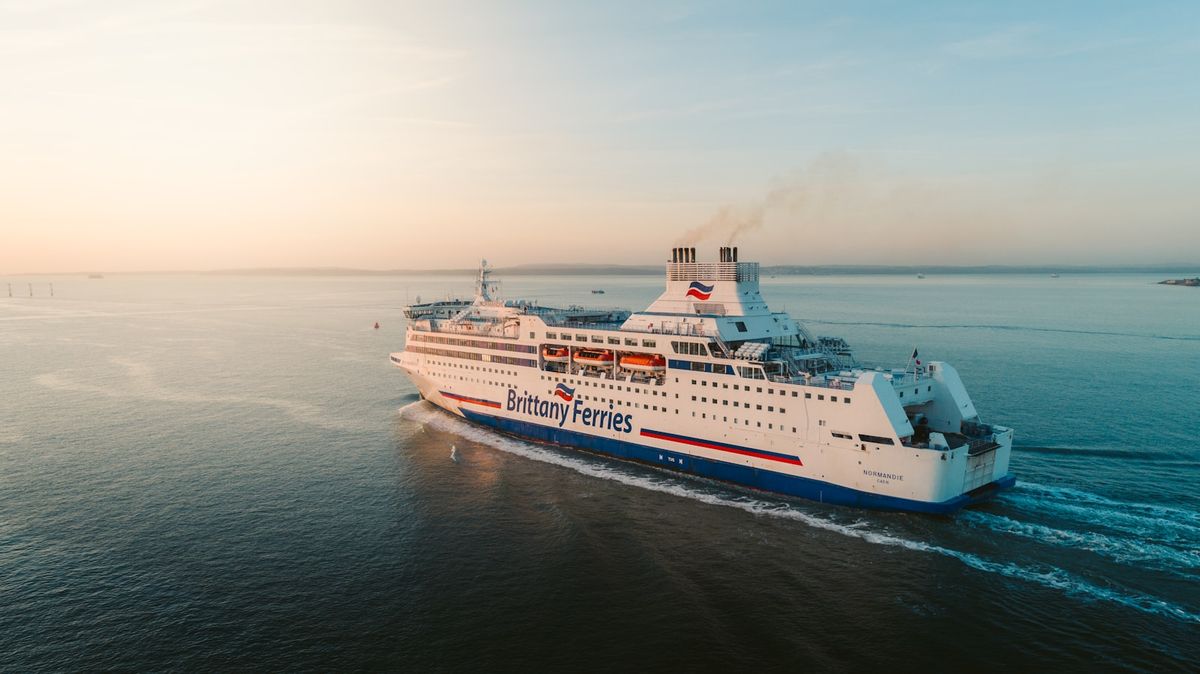 A large ro-pax ferry sailing in a bay