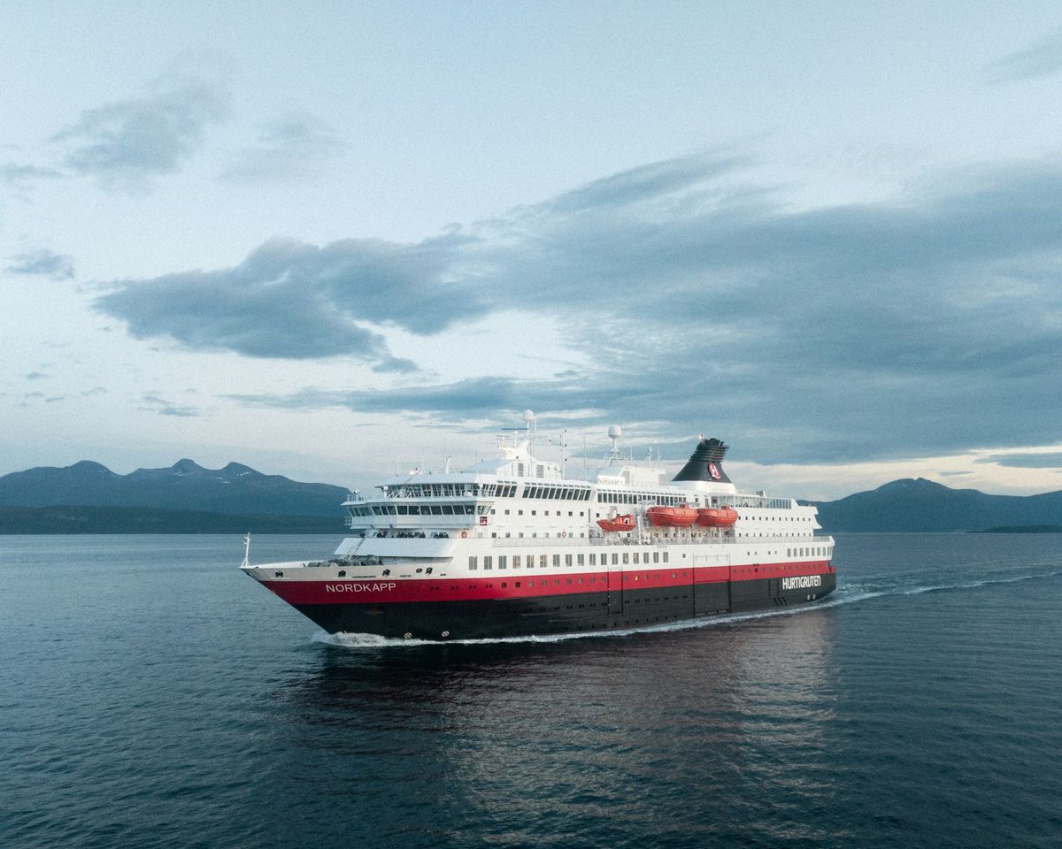 Hurtigruten coastal ferry sailing along the Norwegian coast