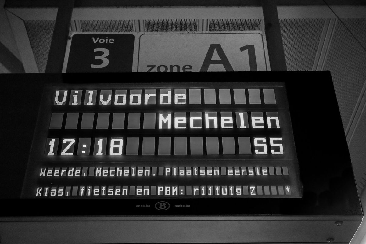 European train departure board showing journey times